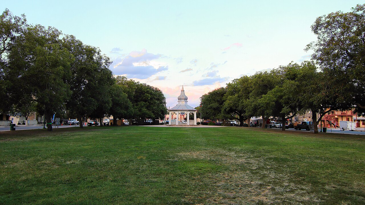 Main Plaza in downtown Boerne, Texas, at dusk in August 2026