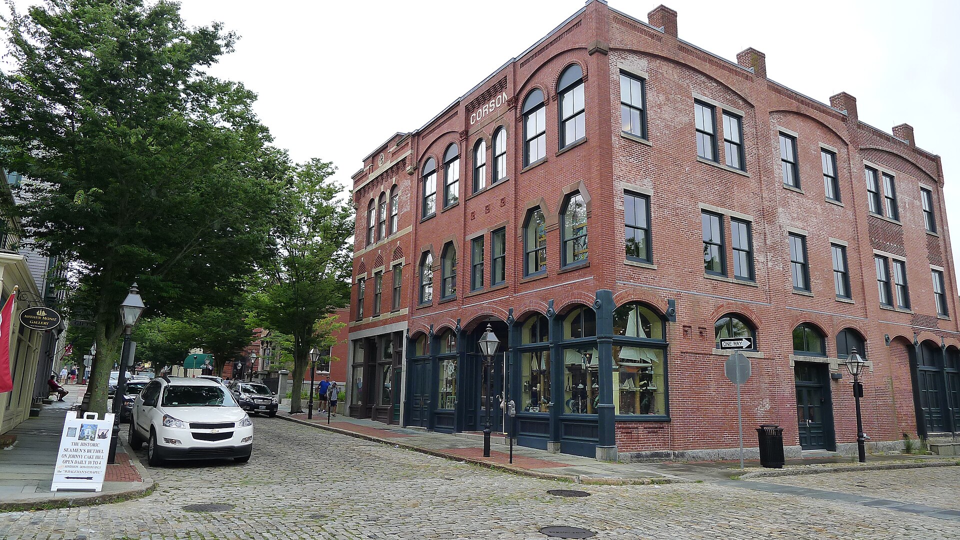 Cobblestone street and the brick Corson building in downtown New Bedford, Massachusetts