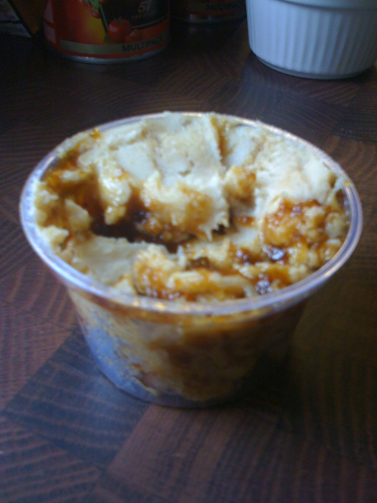 Rendered beef fat, known in Yorkshire as mucky fat or dripping, with brown sediment and stock left from a roast
